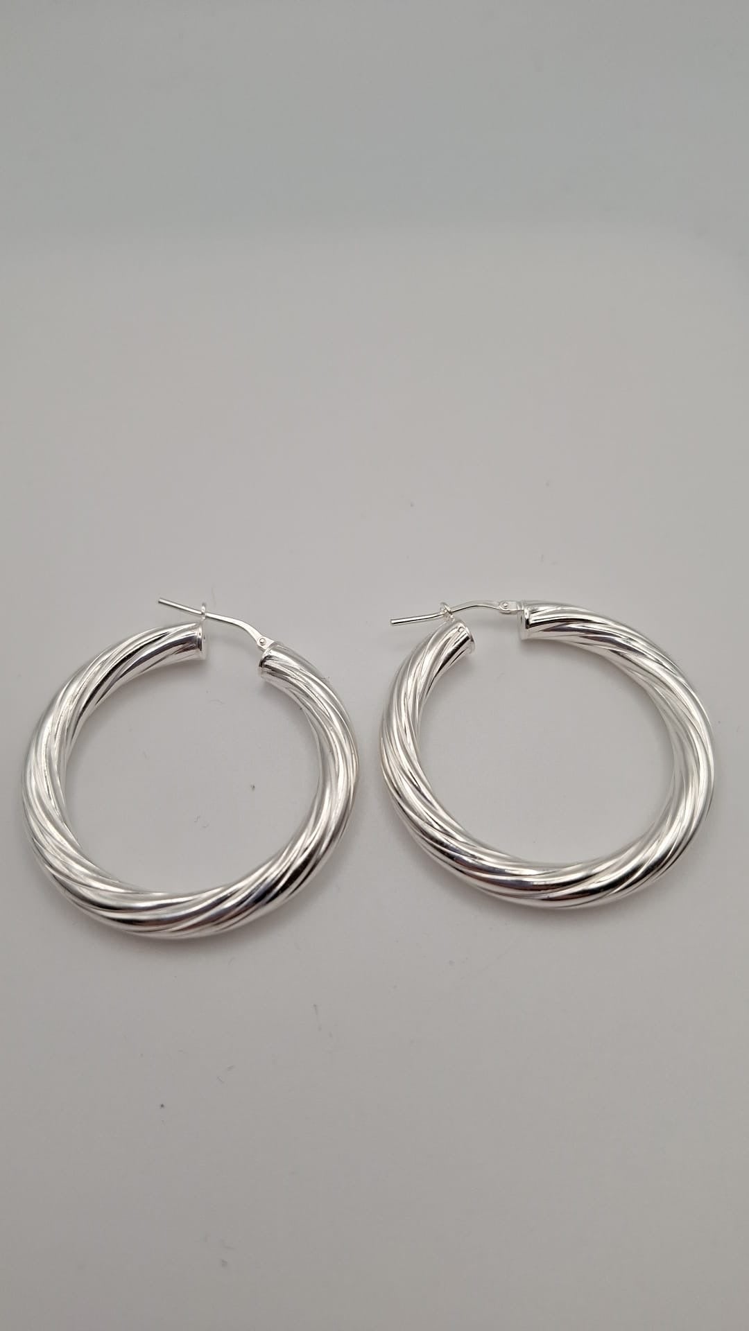 Hollow 925 Sterling Silver Twist hoop earrings